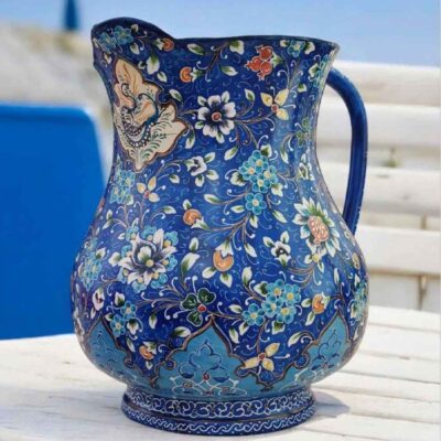 إبريق نحاسي زخرفي مصنوع يدوياً بتزيين المينا الإيراني