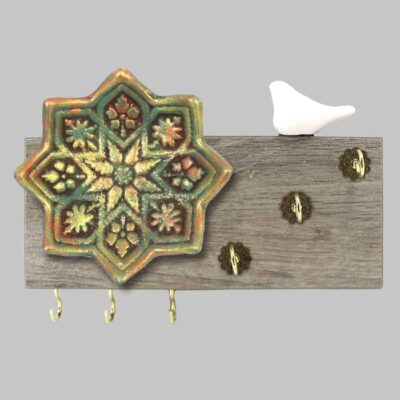 حامل مفاتيح حائط مزخرف بتصميم شمسة الطيور وبلاط