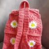 حقيبة كروشيه يدوية بتصميم زهري للأطفال باللون الوردي – أنيقة ولطيفة