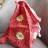 حقيبة كروشيه يدوية بتصميم زهري للأطفال باللون الوردي – أنيقة ولطيفة