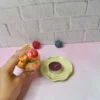 حامل شموع سيراميكي مزخرف بتصميم بيت القطط