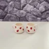 كوب سيراميك للأناقة اليومية باللون الأبيض